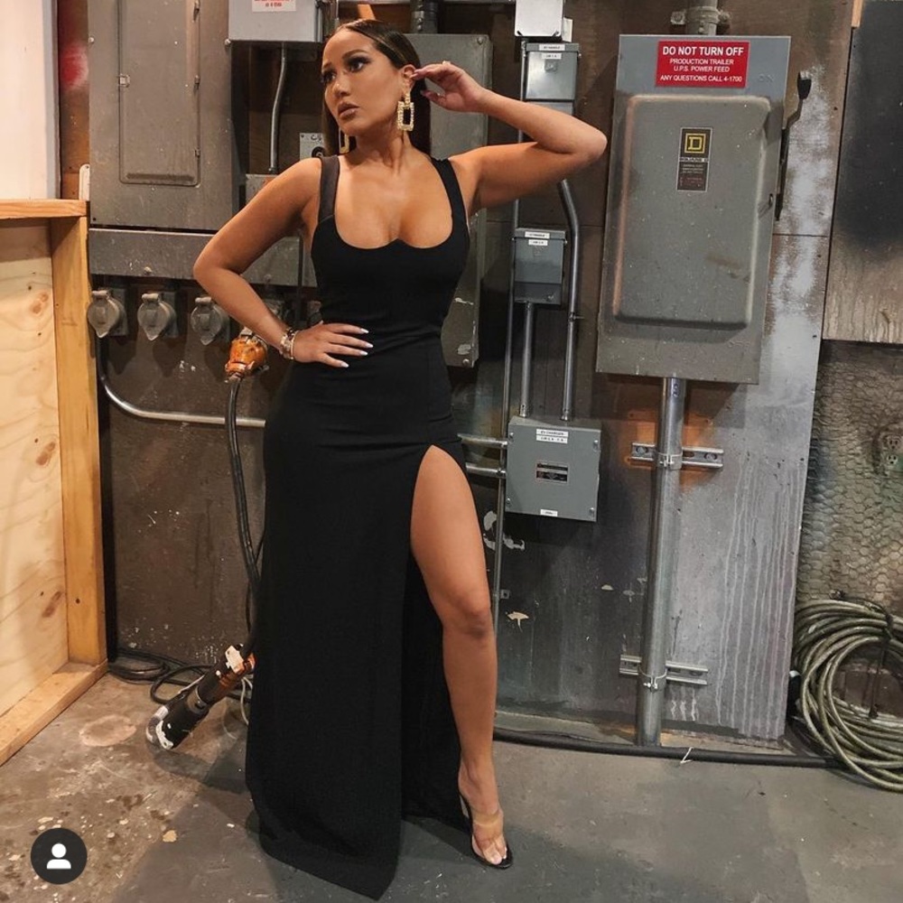 One slit black dress